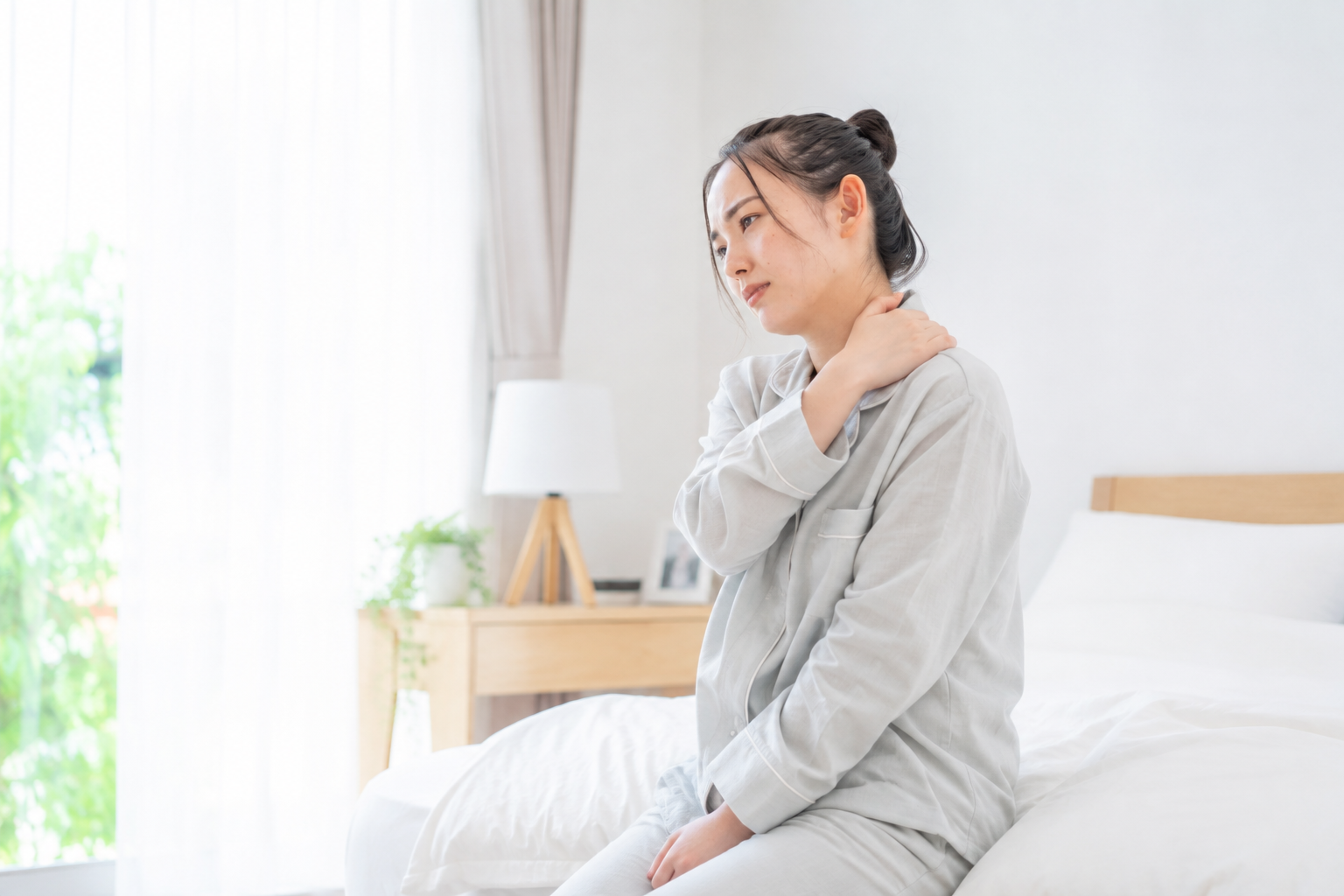 自律神経の不調でつらそうな女性